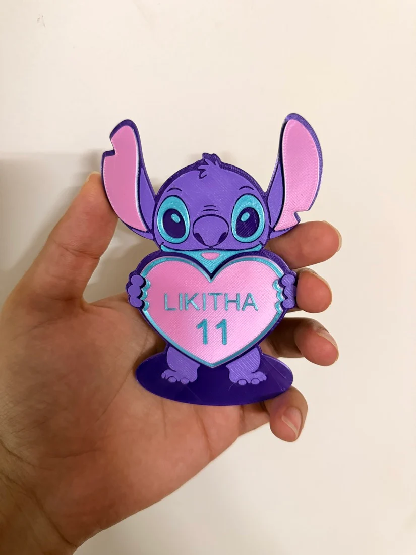 Our printed Stitch Heart fridge magnet with example personalisation