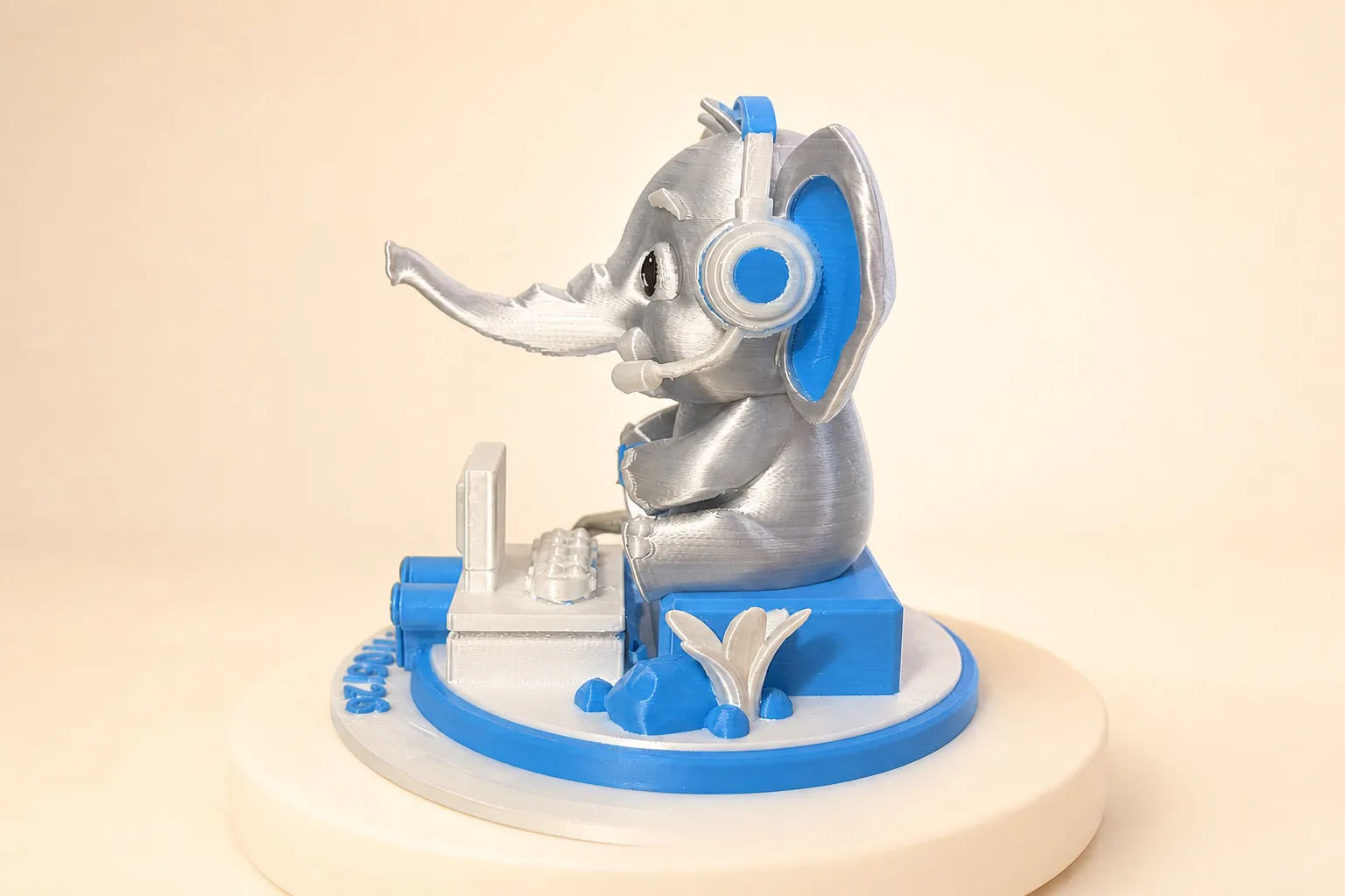 Playful silver and blue gaming elephant personalised keepsake, left profile